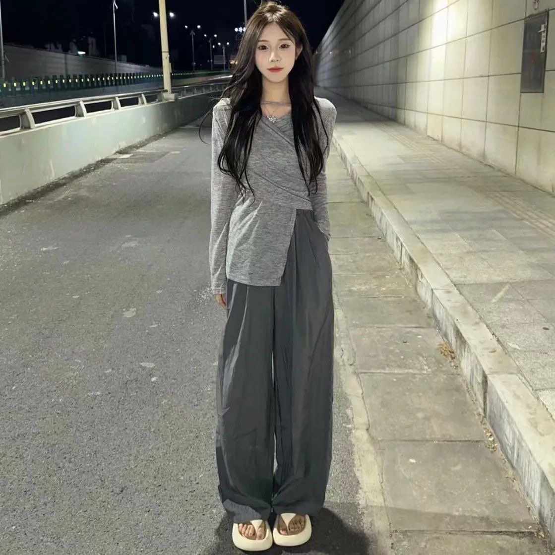 The same irregularly split long-sleeved shirt high waist wide leg drop trouser suit