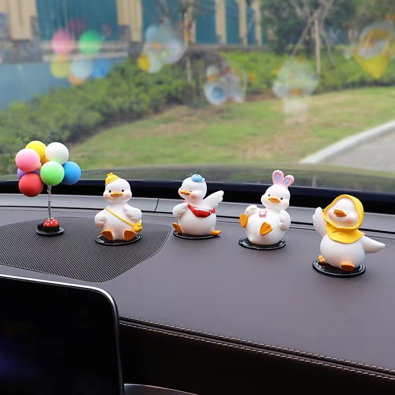 Net red duckling car decoration 2024 new creative cute car center console car interior decoration female