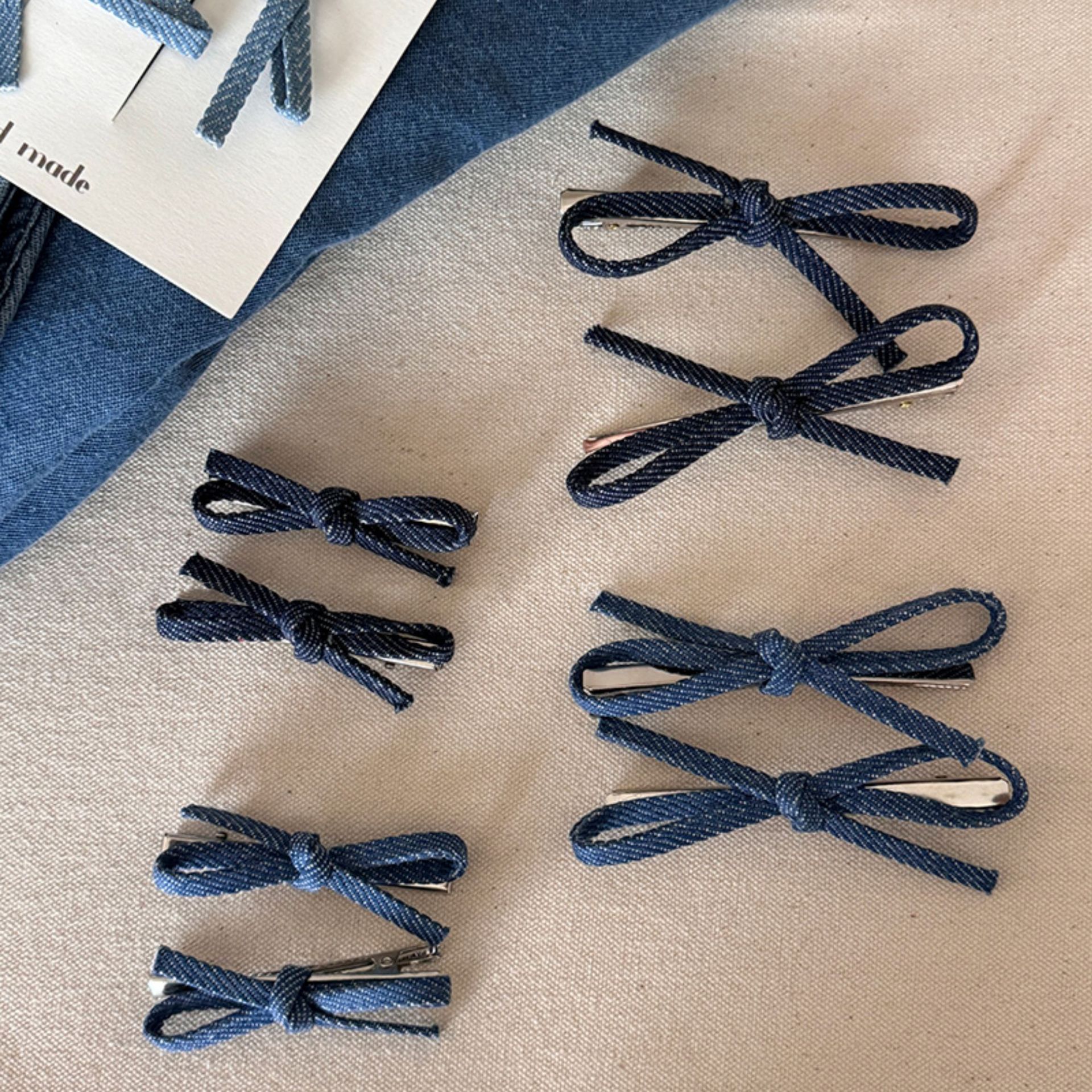 French bow cowboy hairpin Women 2024 new superior sense bangs broken hair side with duck beak clip hair accessories